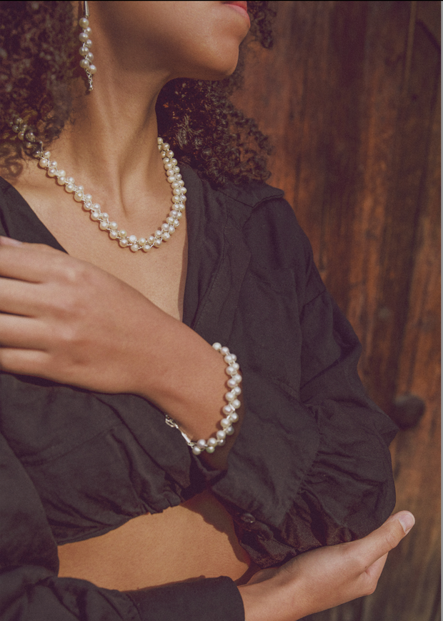 White freshwater pearl set: necklace, earrings, and bracelet